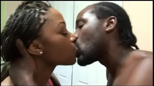 Black star Sin-A-Men takes off her red underware and rides cock for a bit of cum