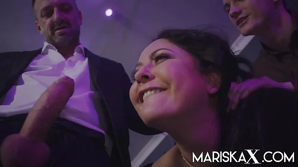 Busty brunette has each of her holes stuffed by two well hung men