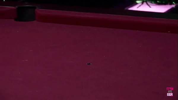 Following their billiards match, the females were struck by many men on the pool table