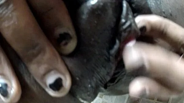 Petite ebony babe pussy play in the shower