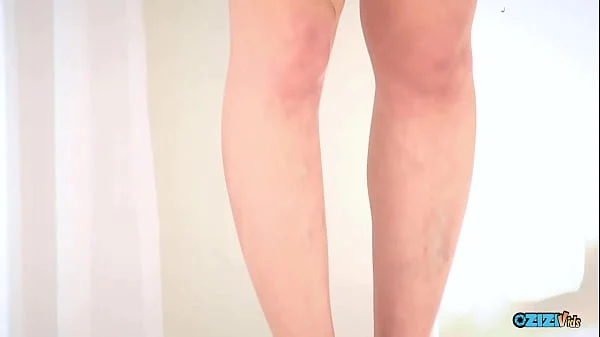 She lay supine as two men inserted many sex devices inside her.