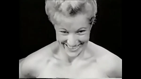 Cute classic beauty rubs herself for the camera