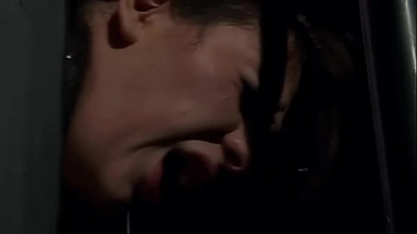 She is in rope chest harness, and her hands are lifted up at her behind. And she suffers, while her Master whipping her.