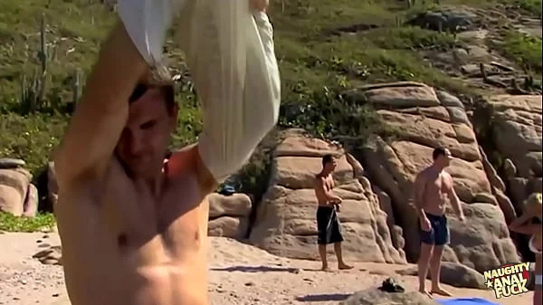 A woman with blonde hair and an attractive physique engages in sexual activity with two men in a pub in the absence of any witnesses