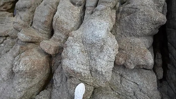 Girl at the beach deepthroats like a goddess