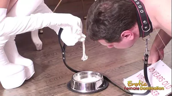 Slave is humiliated and whipped by giantess domme in white outfit